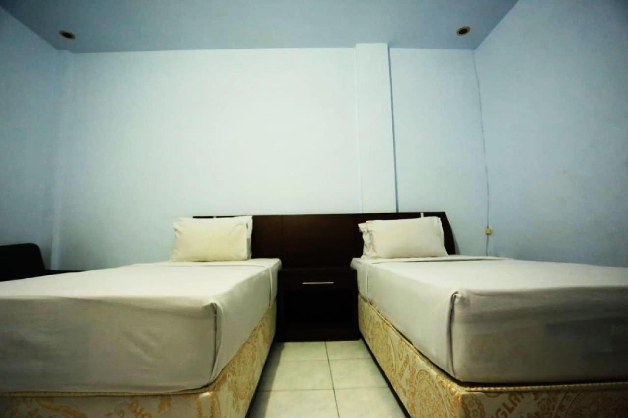 Urbanview Hotel Mulia Indah Palopo ภายนอก รูปภาพ